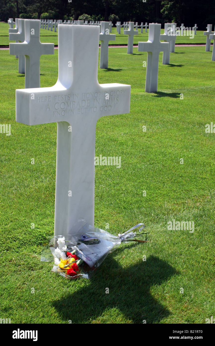 Floral bouquet laid at the tomb of an unknown soldier at the  Normandy American Cemetery and Memorial Stock Photo