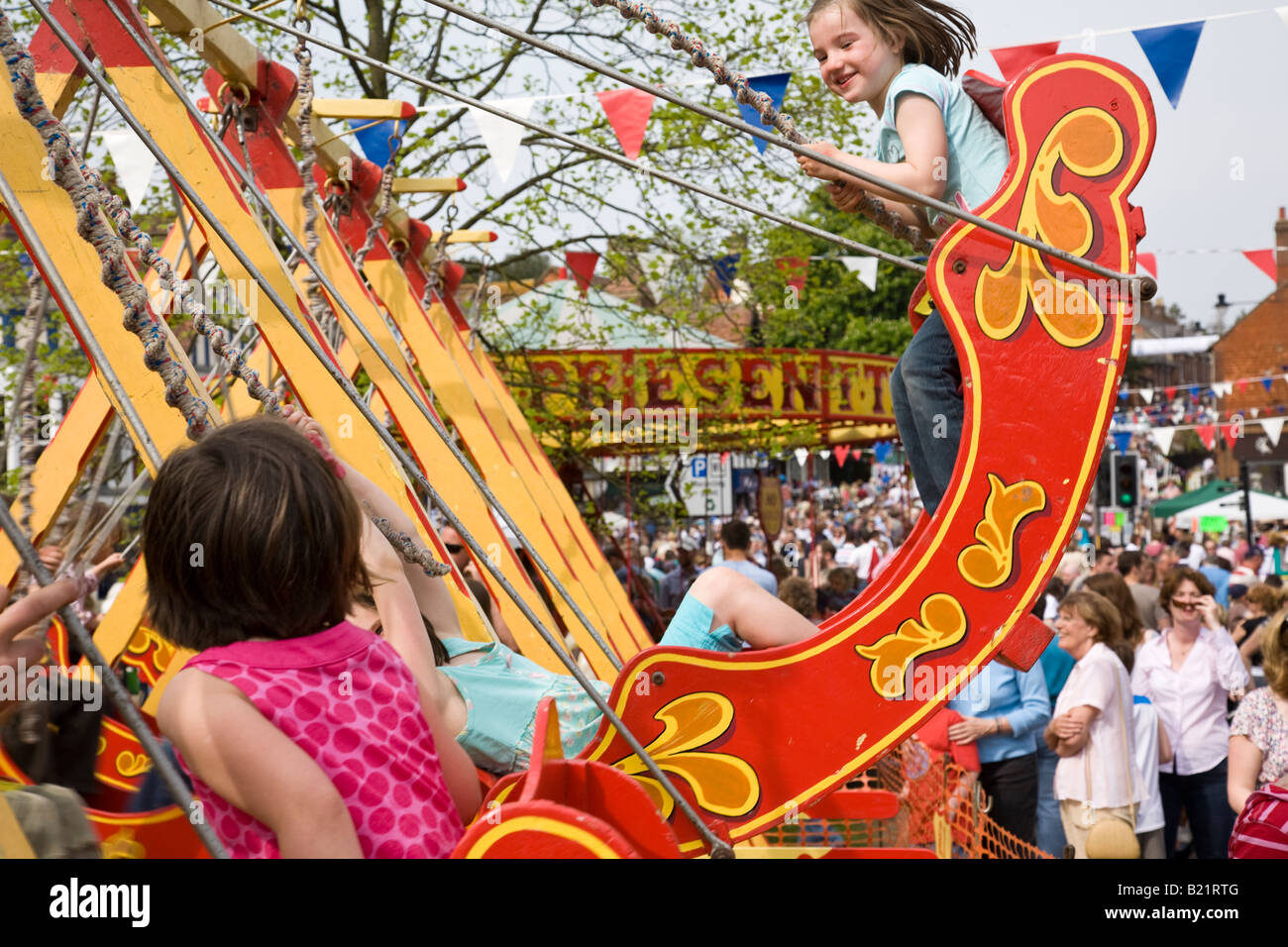 Fairground swing ride children hi-res stock photography and images - Alamy