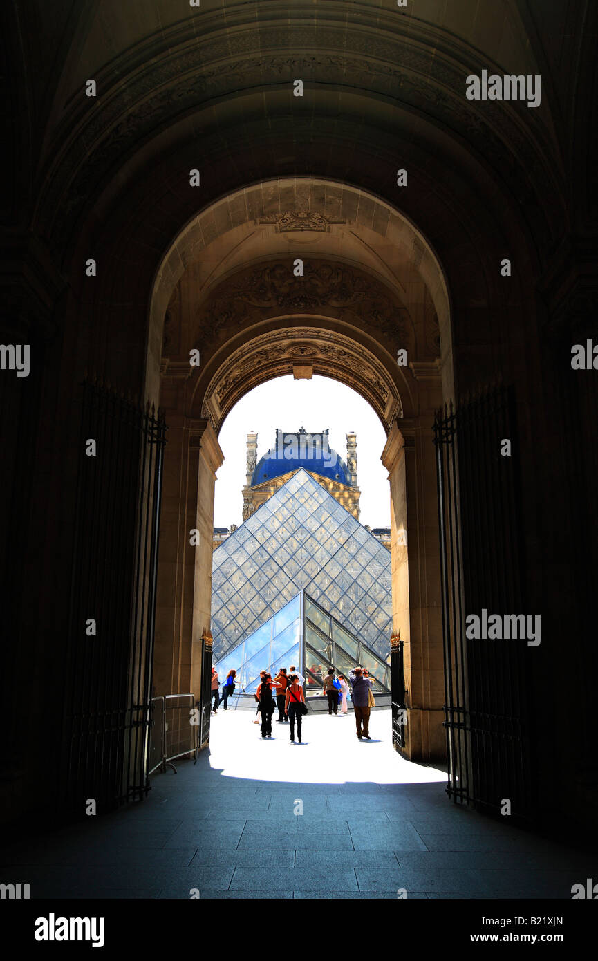 The Glass Pyramid from inside the Richelieu wing of the Louvre Paris. Stock Photo