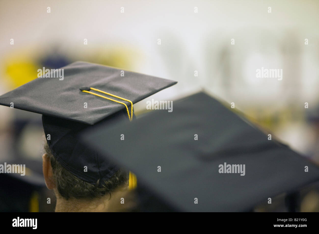 Students sit during the graduation ceremony at Massachusetts College of ...