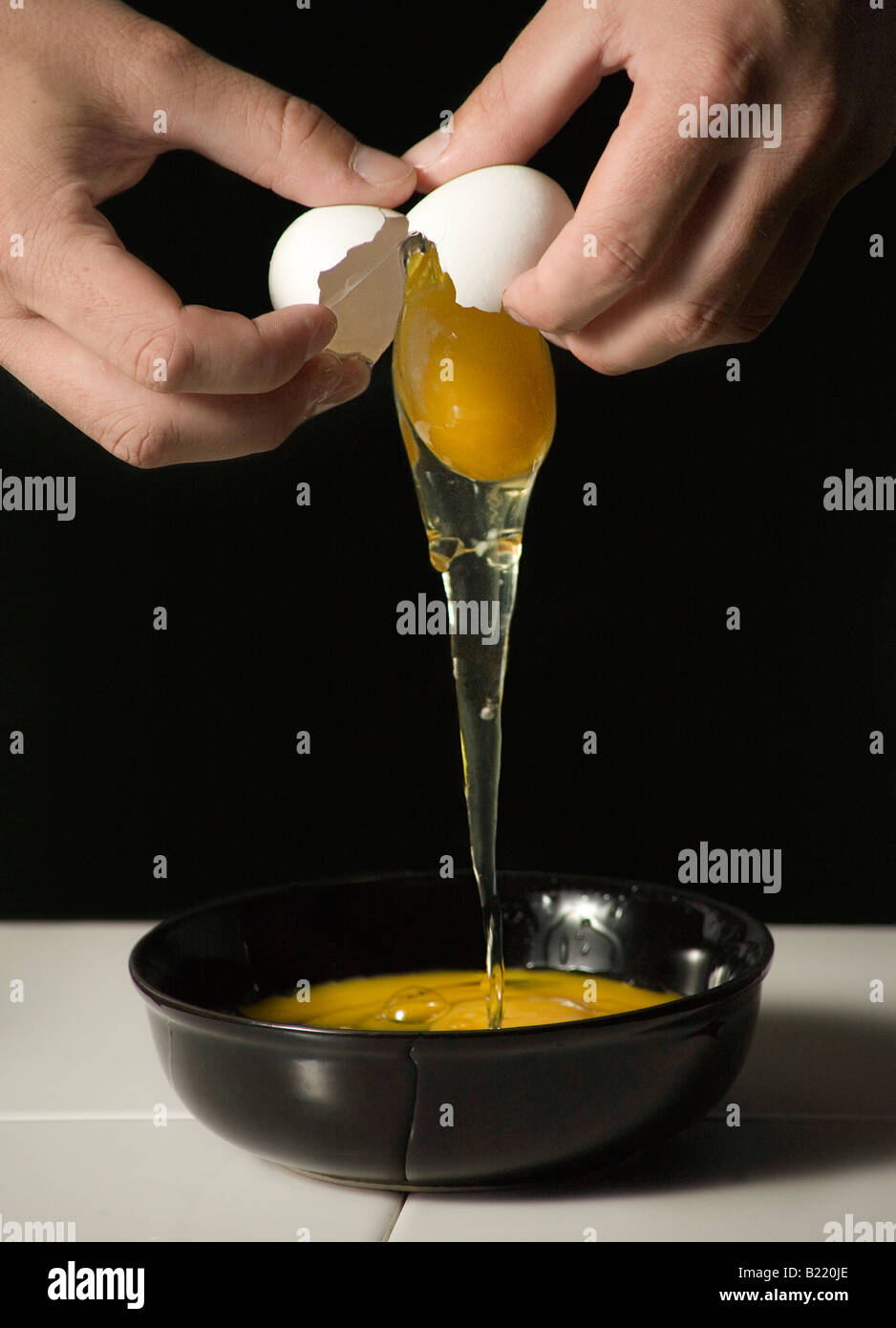 Person Cracking Egg Stock Photo Alamy