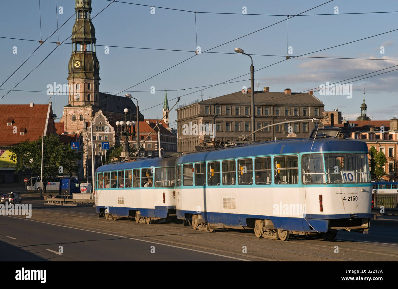 Tram on Akmens Bridge and St Peters Church Riga Latvia Stock Photo - Alamy