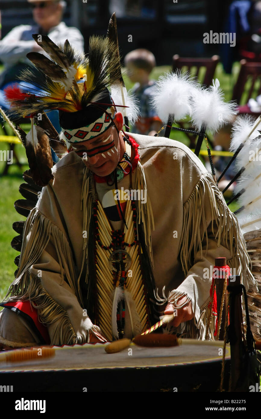 Shawnee Native American man playing drums Shawnee tribe Indians in Ohio OH USA  US living daily life lifestyle hi-res Stock Photo