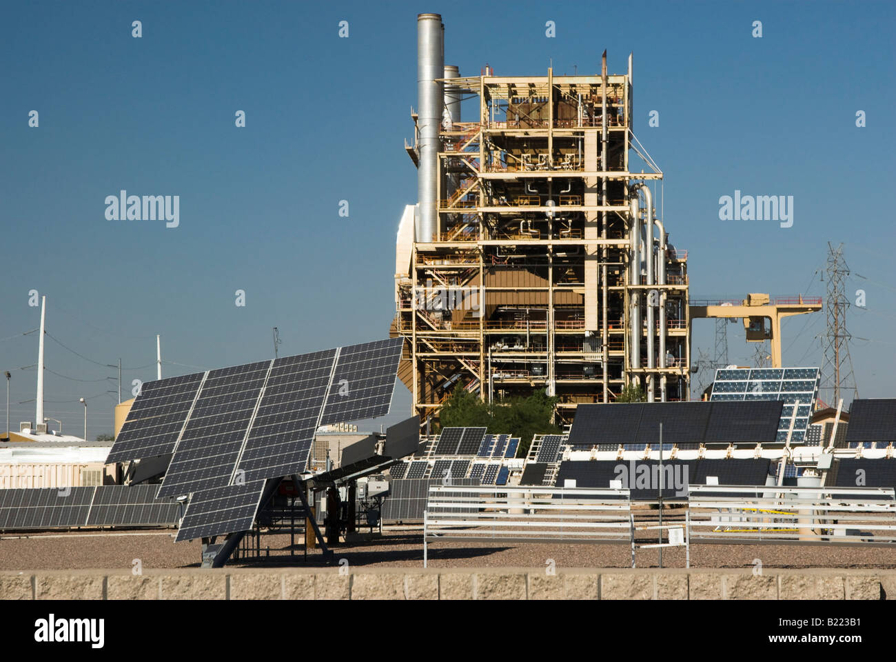solar panels and conventional power plant at a Solar Research Center in Phoenix Arizona Stock Photo