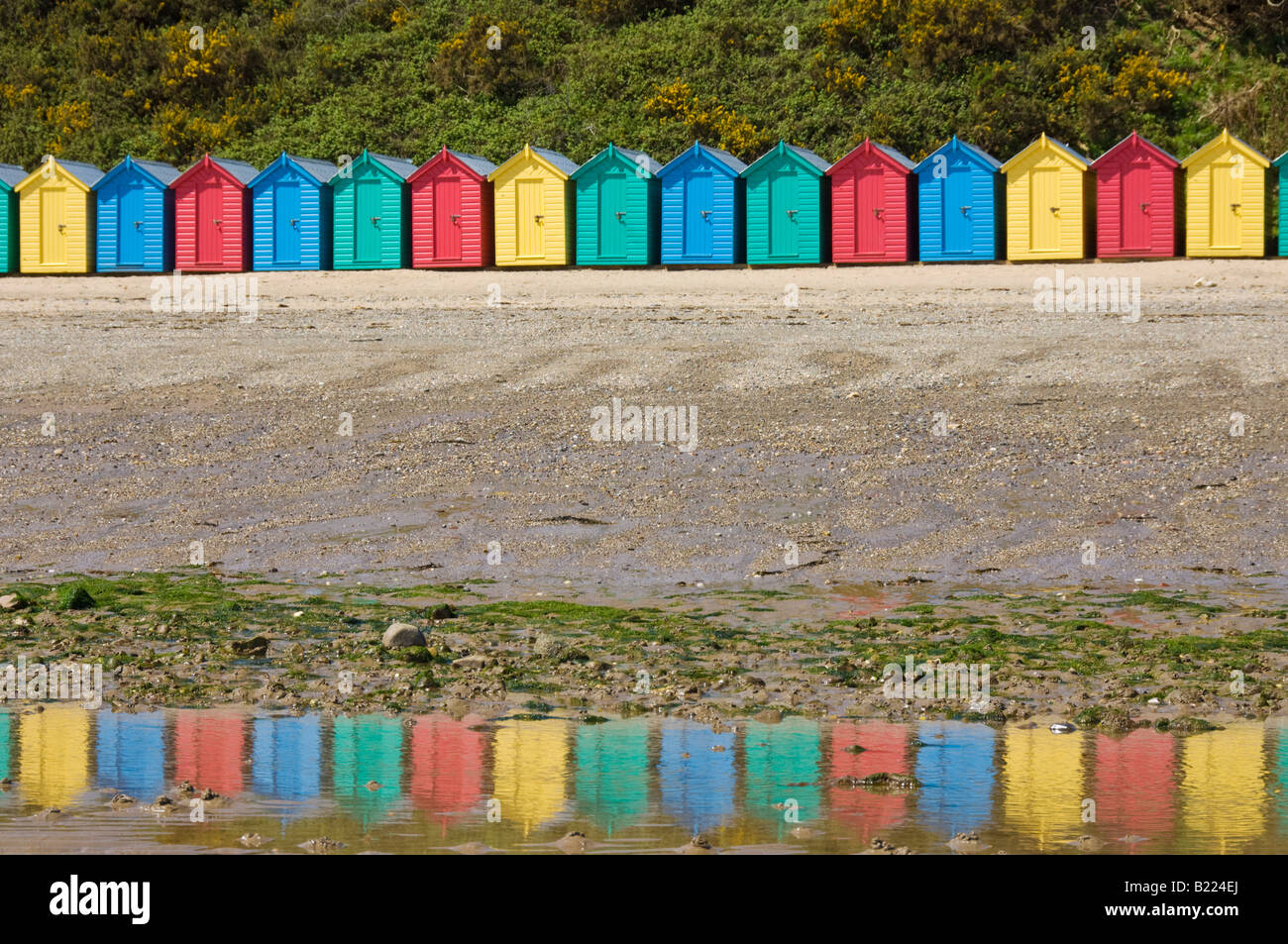Bright painted beach huts on Llanbedrog beach Llyn peninsula Gwynedd North Wales UK GB EU Europe Stock Photo