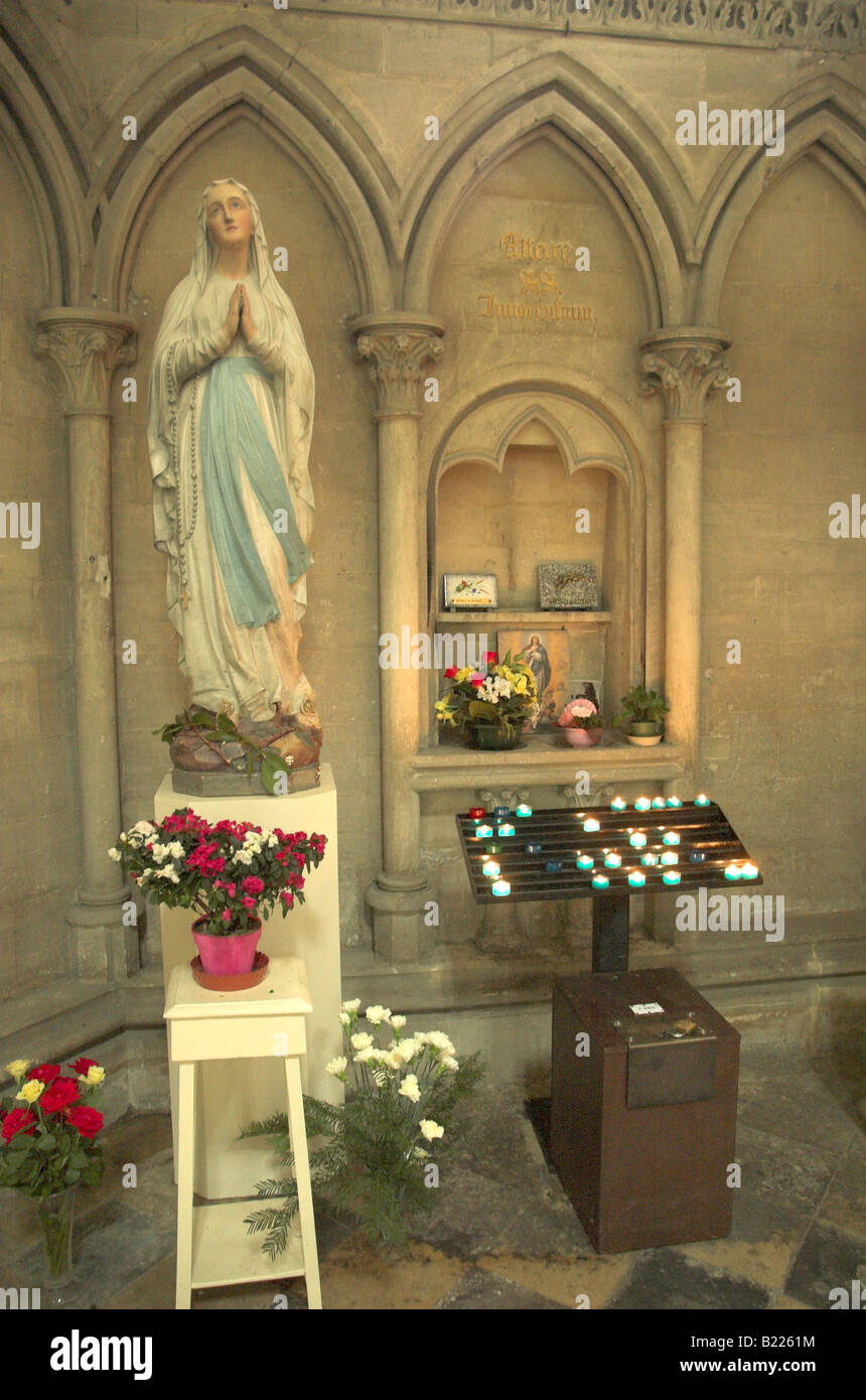 Virgin Mary and votive prayer candles vestibule inside Bayeux Cathedral, France Stock Photo Alamy