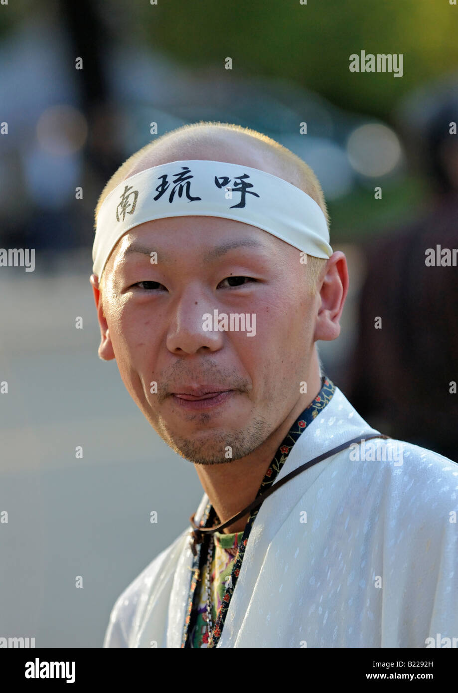 Young Japanese man with headband at Michinoku YOSAKOI Festival Sendai ...