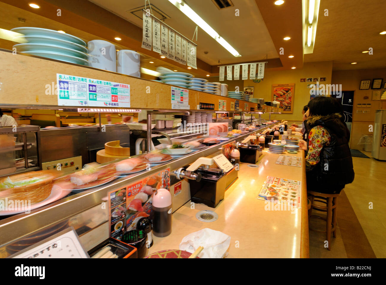 Customers in japanese sushi bar hi-res stock photography and images - Alamy