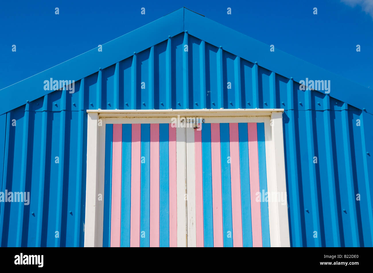 Blue beach hut with pink and white doors Abersoch  on the Llyn Lleyn peninsula Gwynedd North Wales UK GB EU Europe Stock Photo
