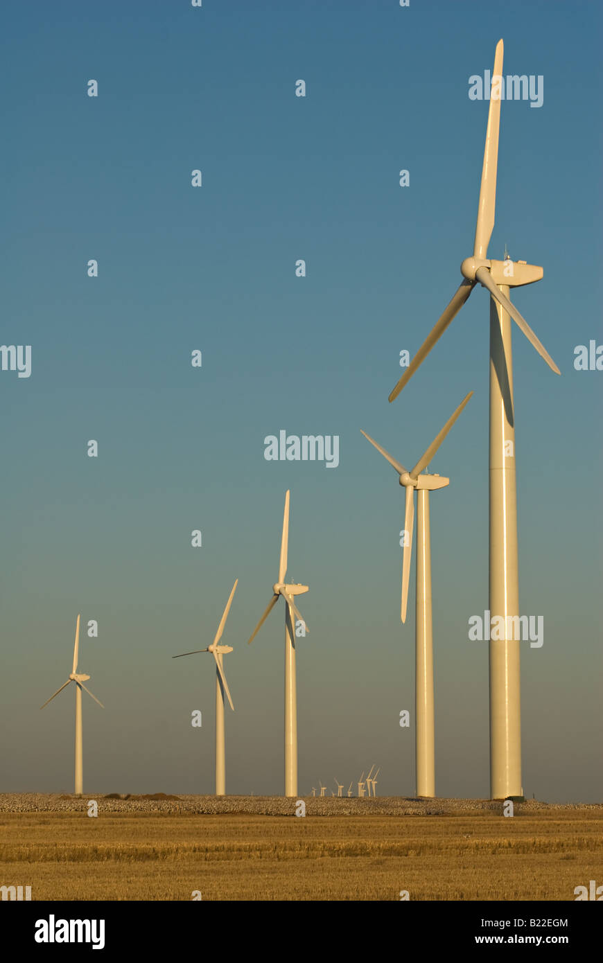 Large wind turbines in west Texas lined up against a dusty sky Stock Photo Alamy