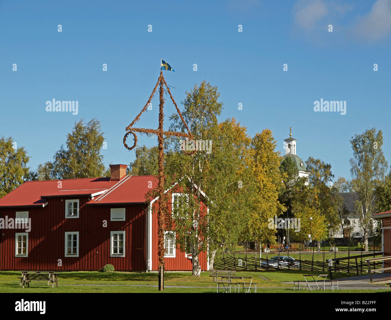 typical scandinavian house with a typical midsummer mast pole in ...