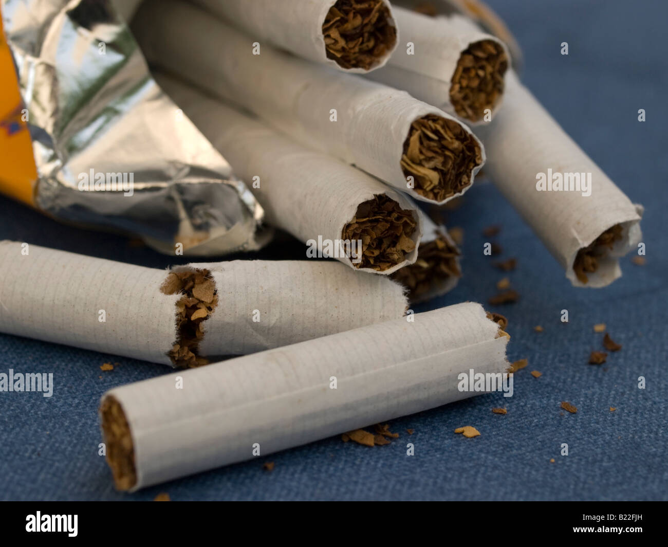broken cigarettes for giving up smoking Stock Photo Alamy
