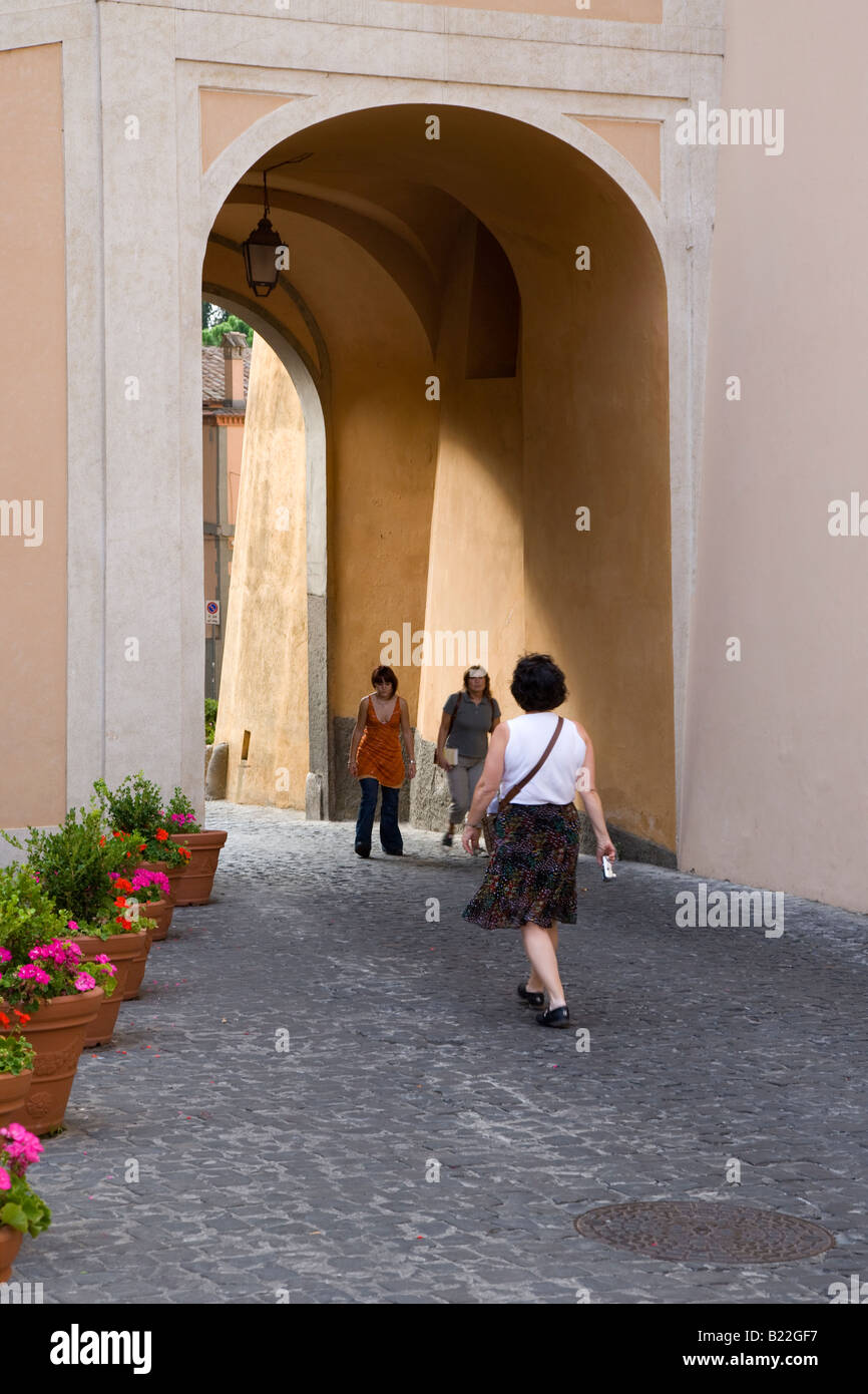 Archway and tourists, Castelgandolfo, Italy Stock Photo