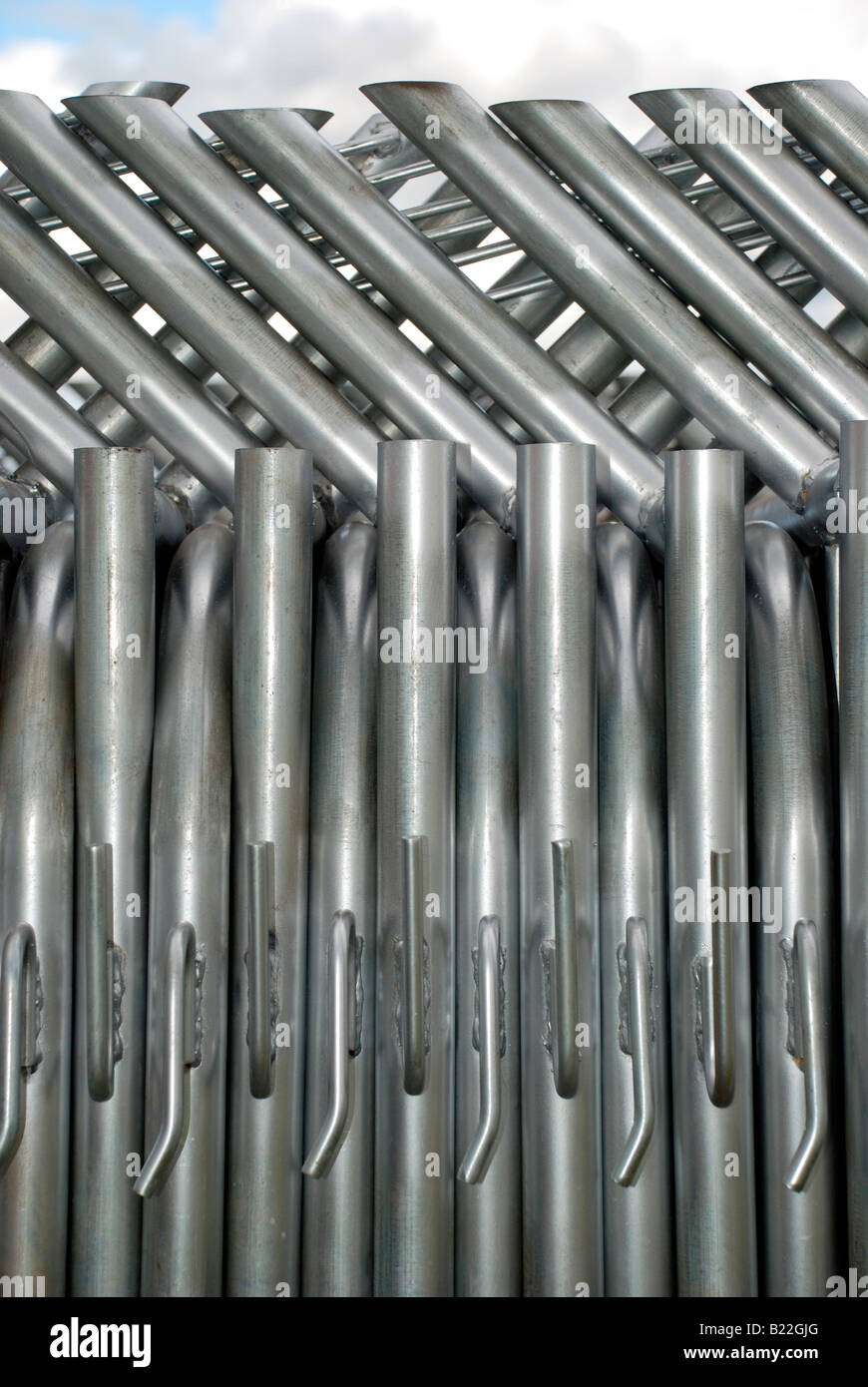metal pipes stack of barriers Stock Photo - Alamy