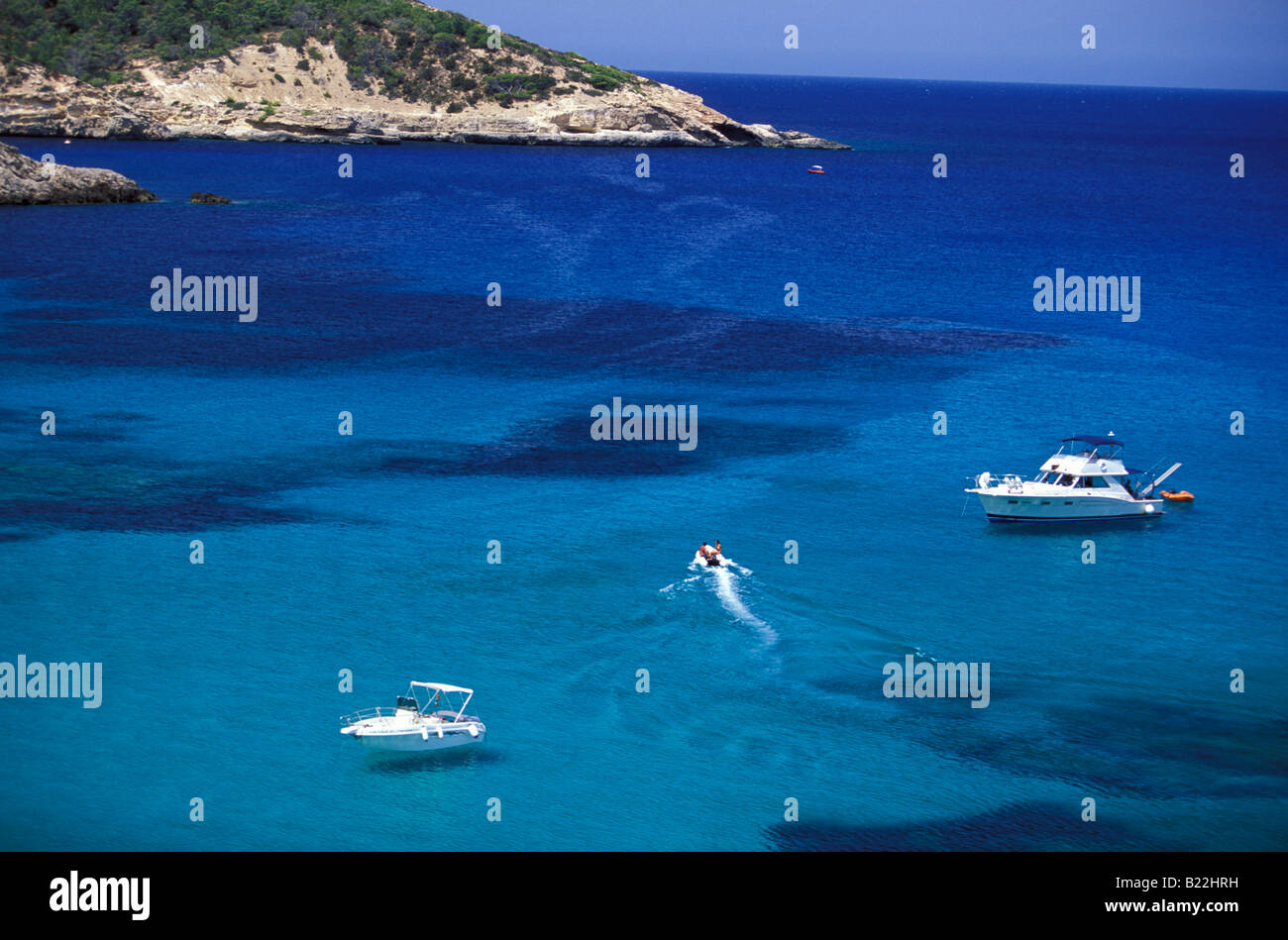 View over bay Cala Xarraca with yachts Portinatx Ibiza Balearic Islands Spain Stock Photo