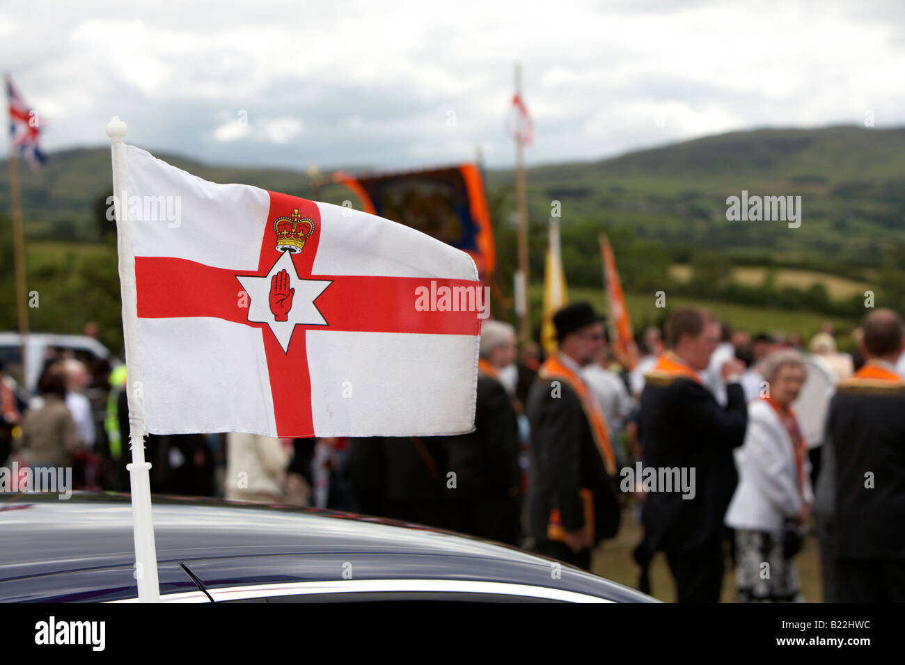 northern ireland ulster flag flying above car during 12th July Orangefest celebrations in Dromara county down northern ireland Stock Photo