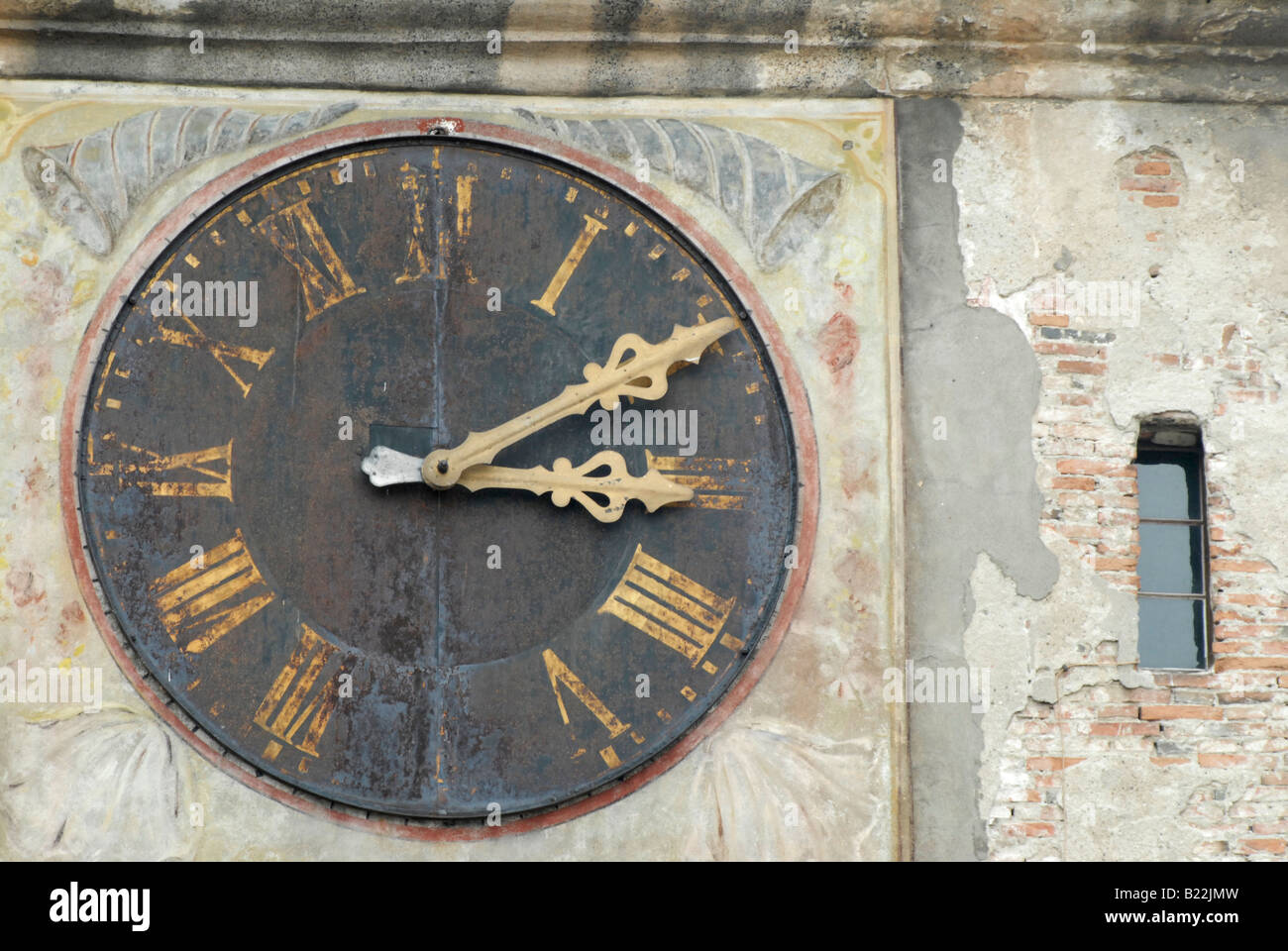 Clock in a tower in a romanian city Stock Photo Alamy