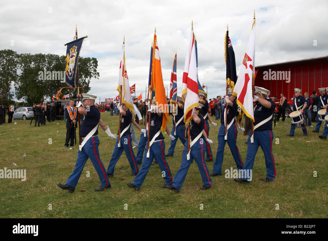 loyalist flute band colour party parade from the field during 12th July