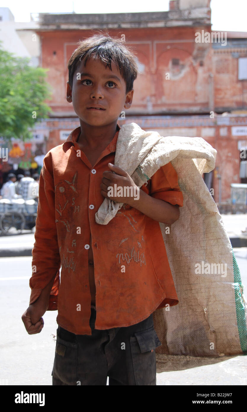 Little Indian poor boy in streets of Jaipur Stock Photo