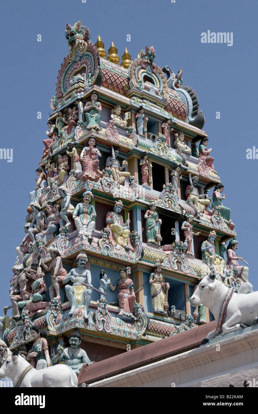 ornate scultures of gods and goddesses on a hindu temple in singapore Stock Photo