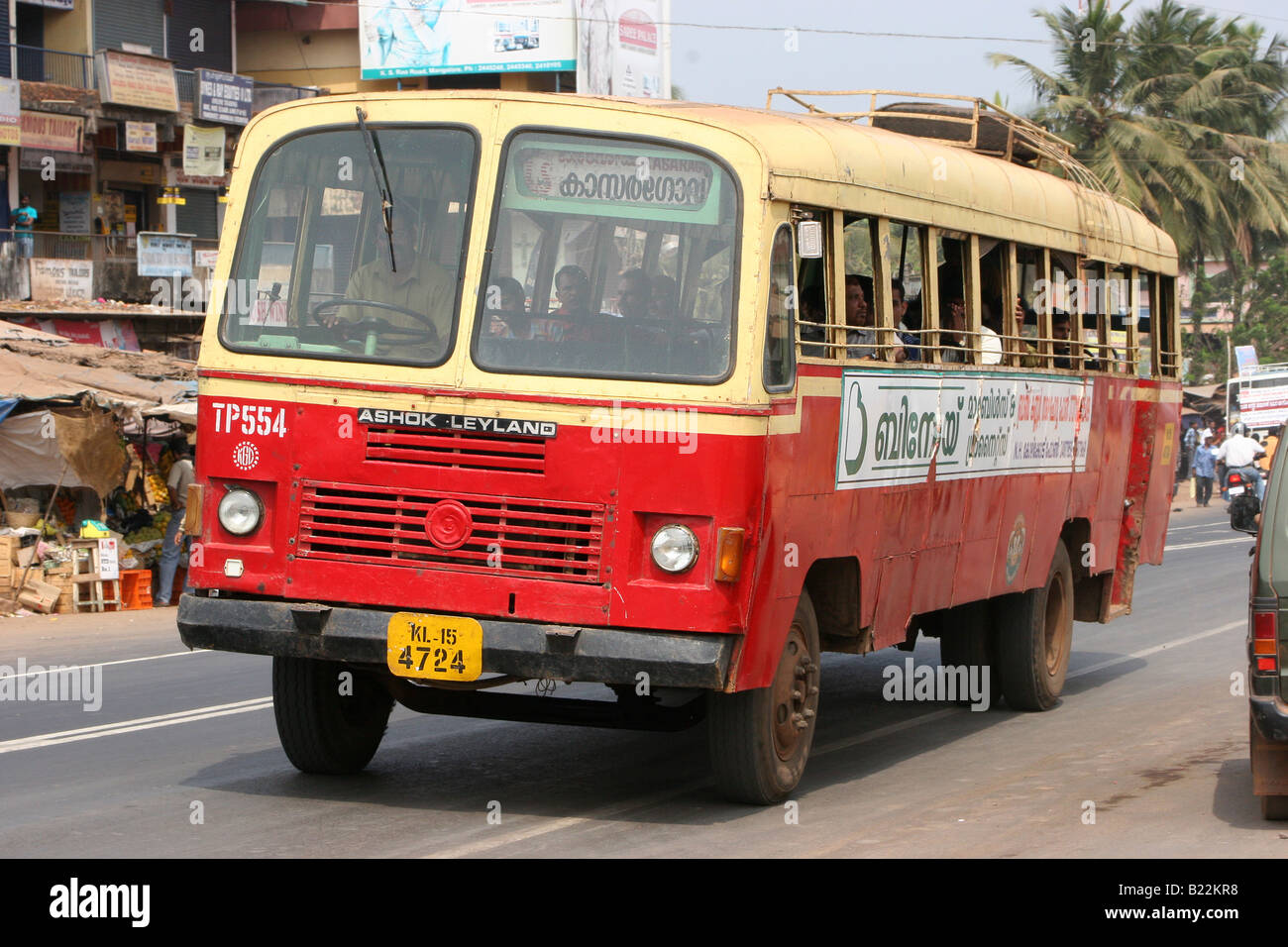 Ashok Leyland bus travels through heavy traffic in Thokkottu near Mangalore Karnataka India Stock Photo