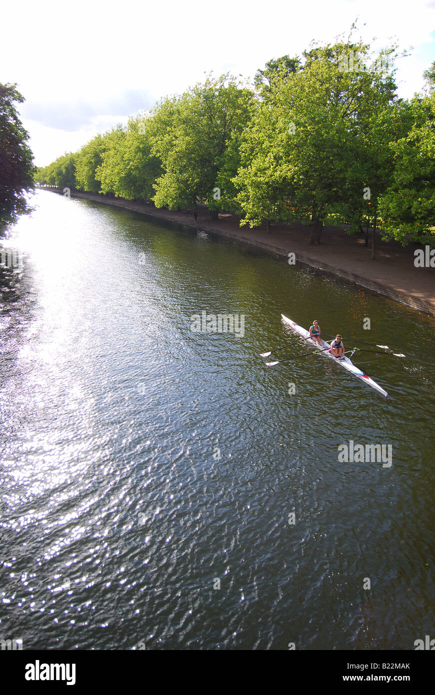 Young women rowing on River Great Ouse, Bedford, Bedfordshire, England