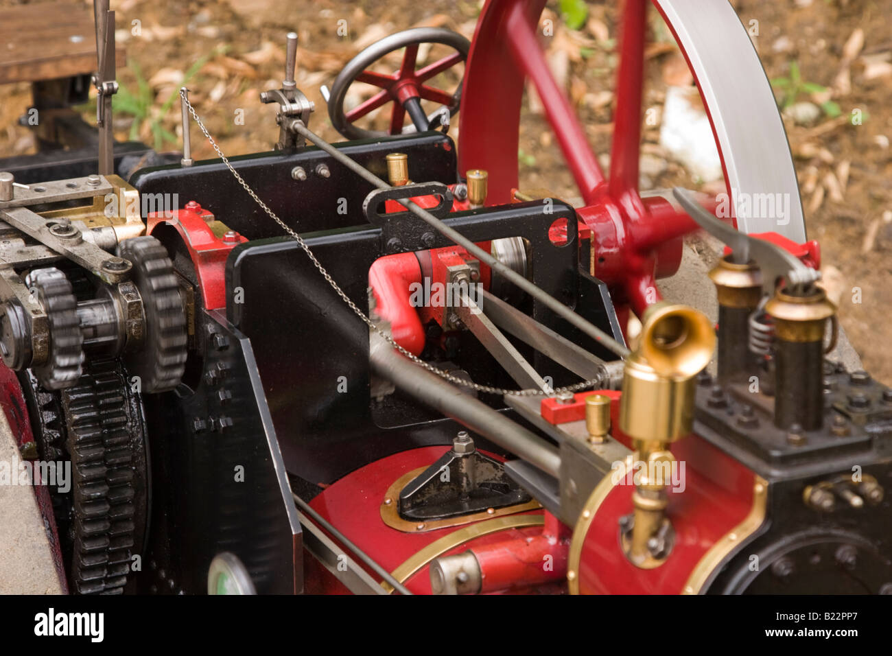 Model traction engine piston and flywheel Stock Photo