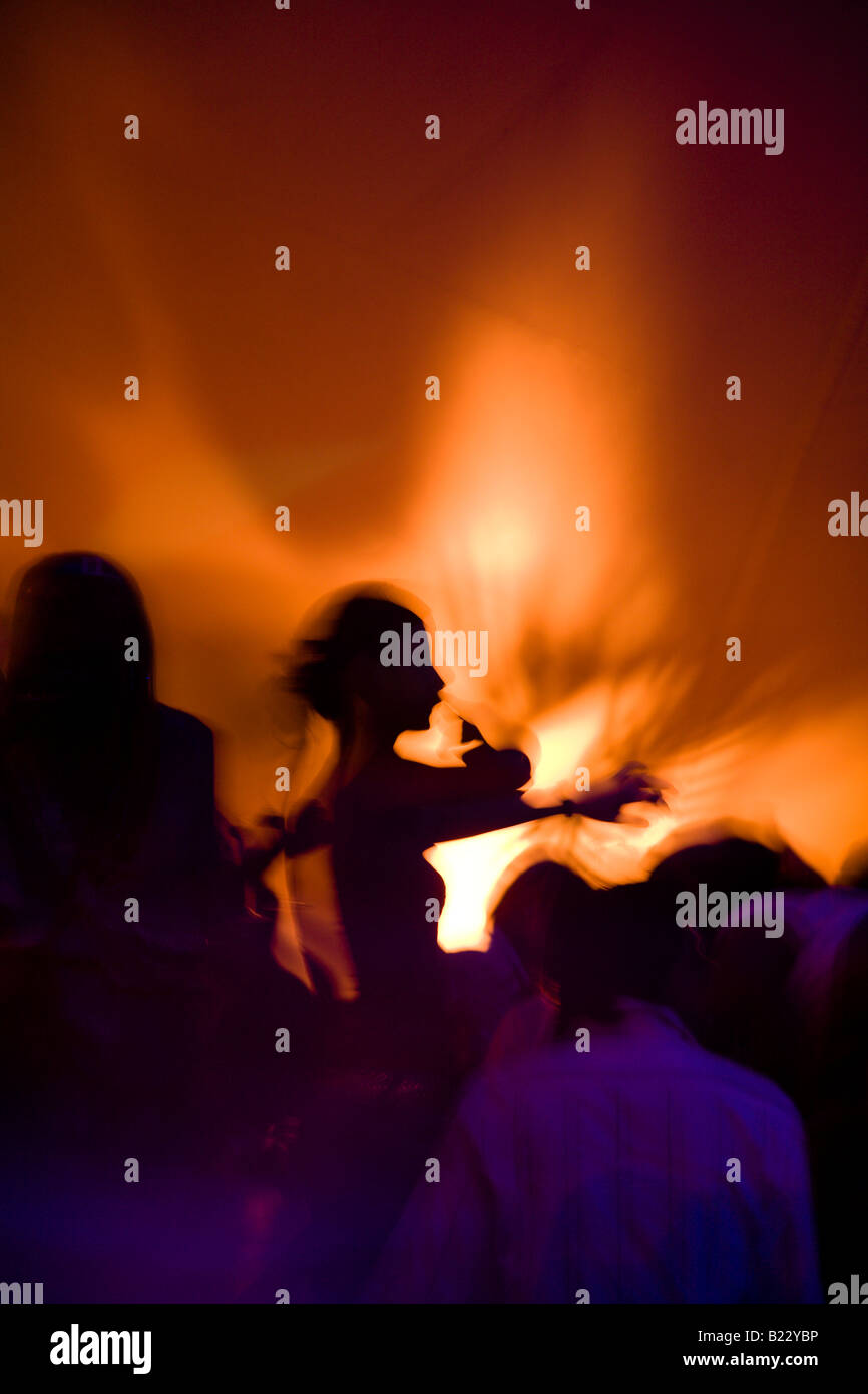 Silhouette of girl dancing in a nightclub Stock Photo - Alamy