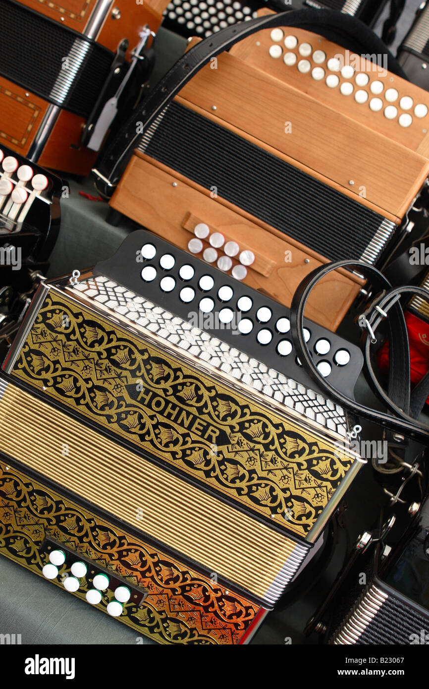 A selection of button accordion melodeon squeezebox musical instruments Honer Stock Photo