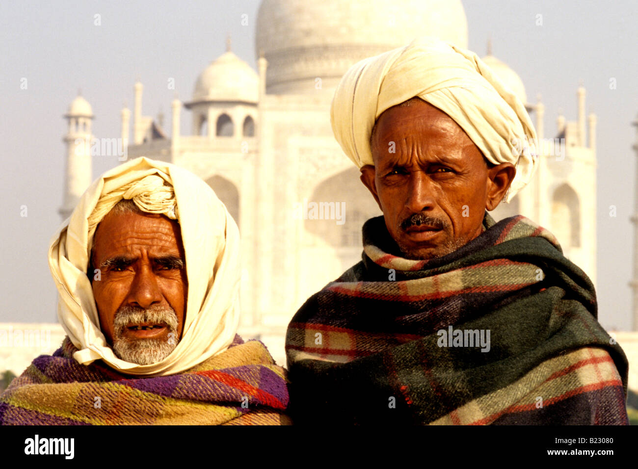 Portrait of two men in front of mausoleum Taj Mahal Agra Uttar Pradesh India Stock Photo