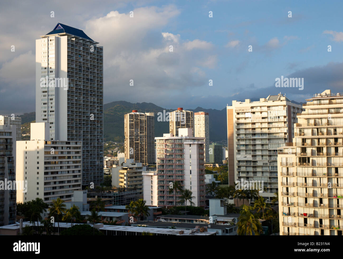 Dusk falls over apartment buildings on Waikiki Beach, Oahu, Hawaii