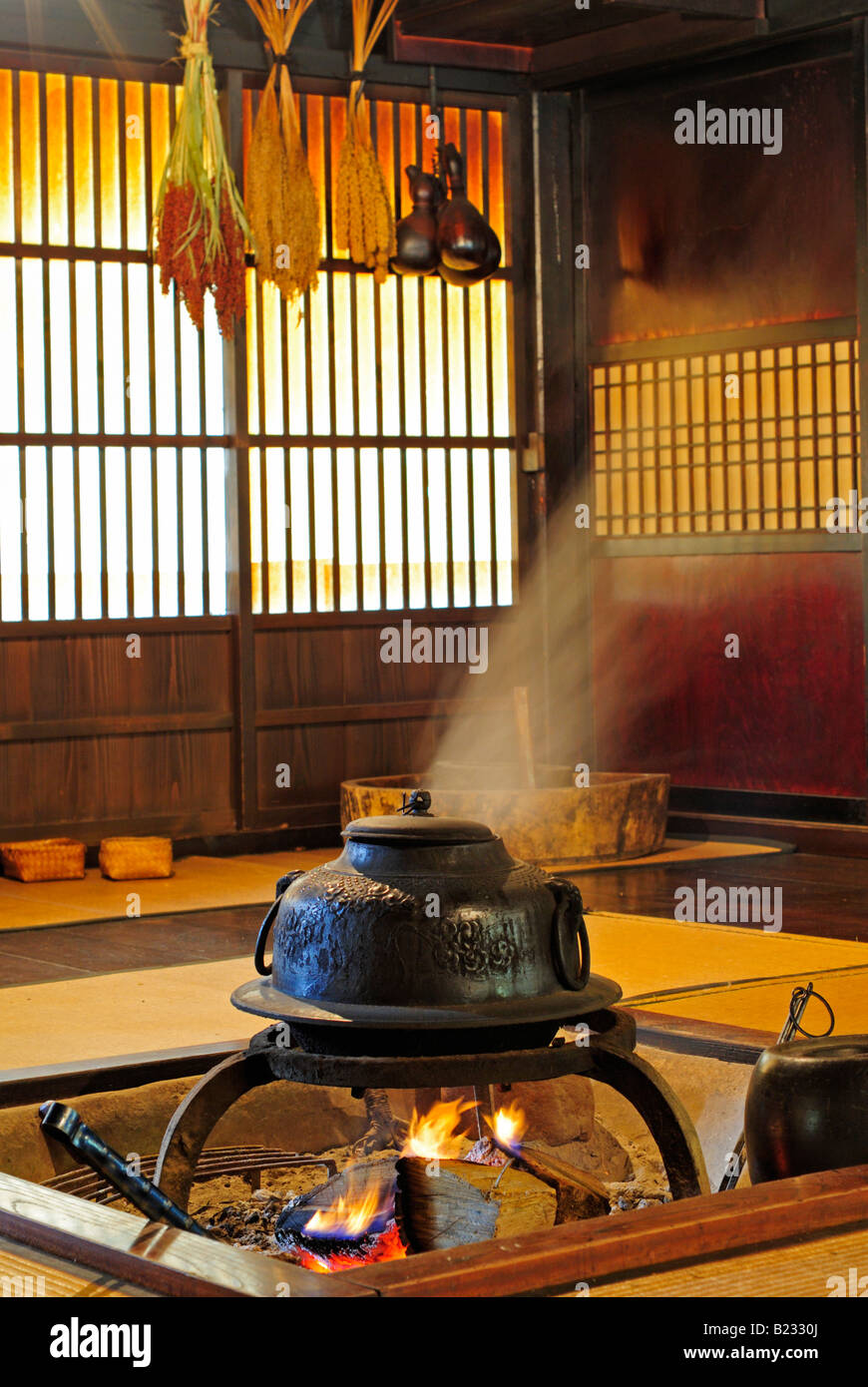 Tea making interior of a traditional gassho zukuri farm house Shirakawa village UNESCO World Heritage site Japan Stock Photo