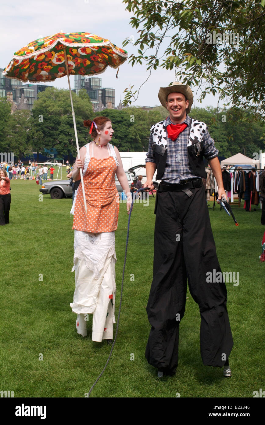 Cowboy and girl entertainers at the 2008 Meadows Festival, Edinburgh Stock Photo