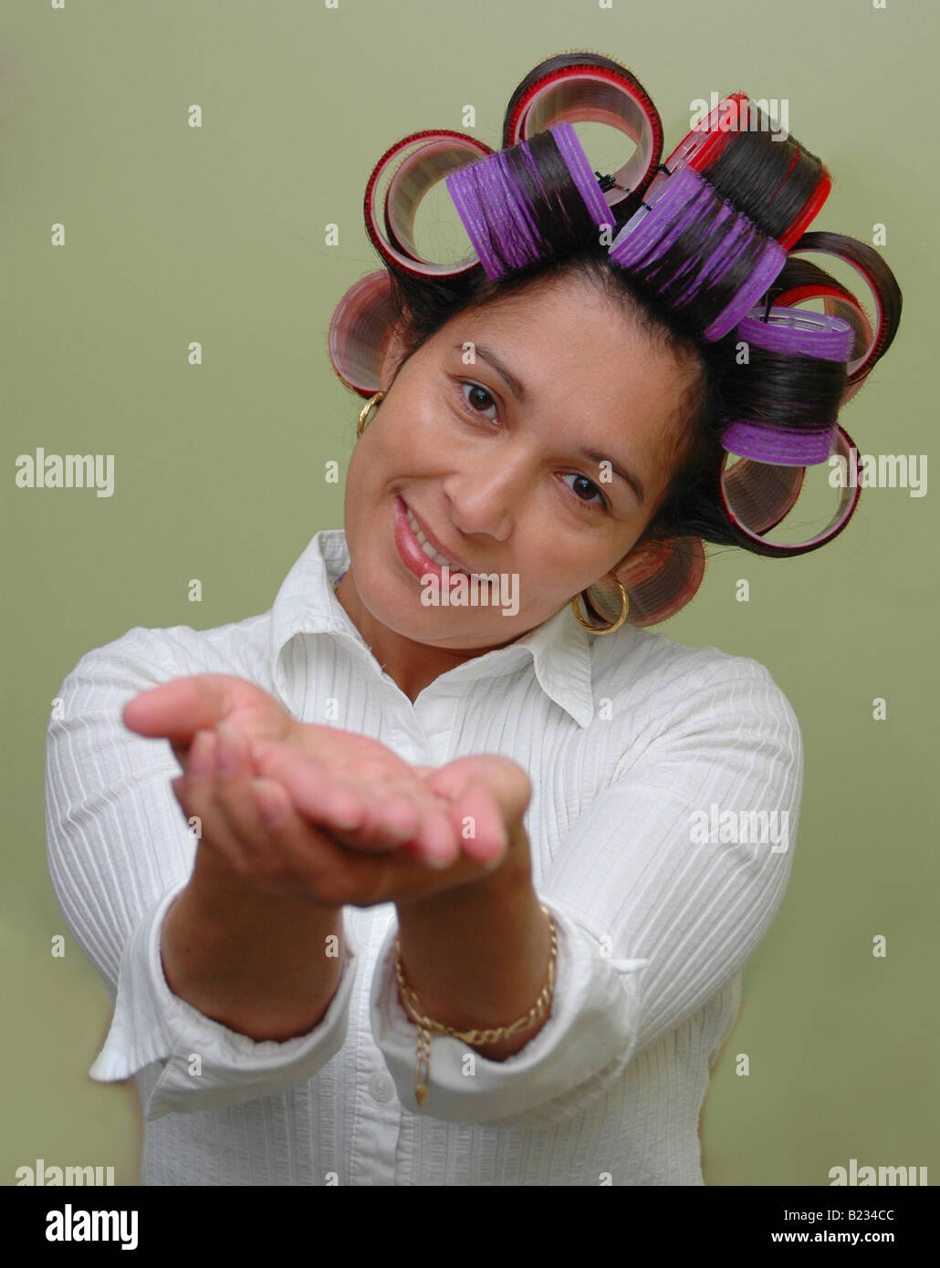 Hair rollers woman and surprised hires stock photography and images Alamy