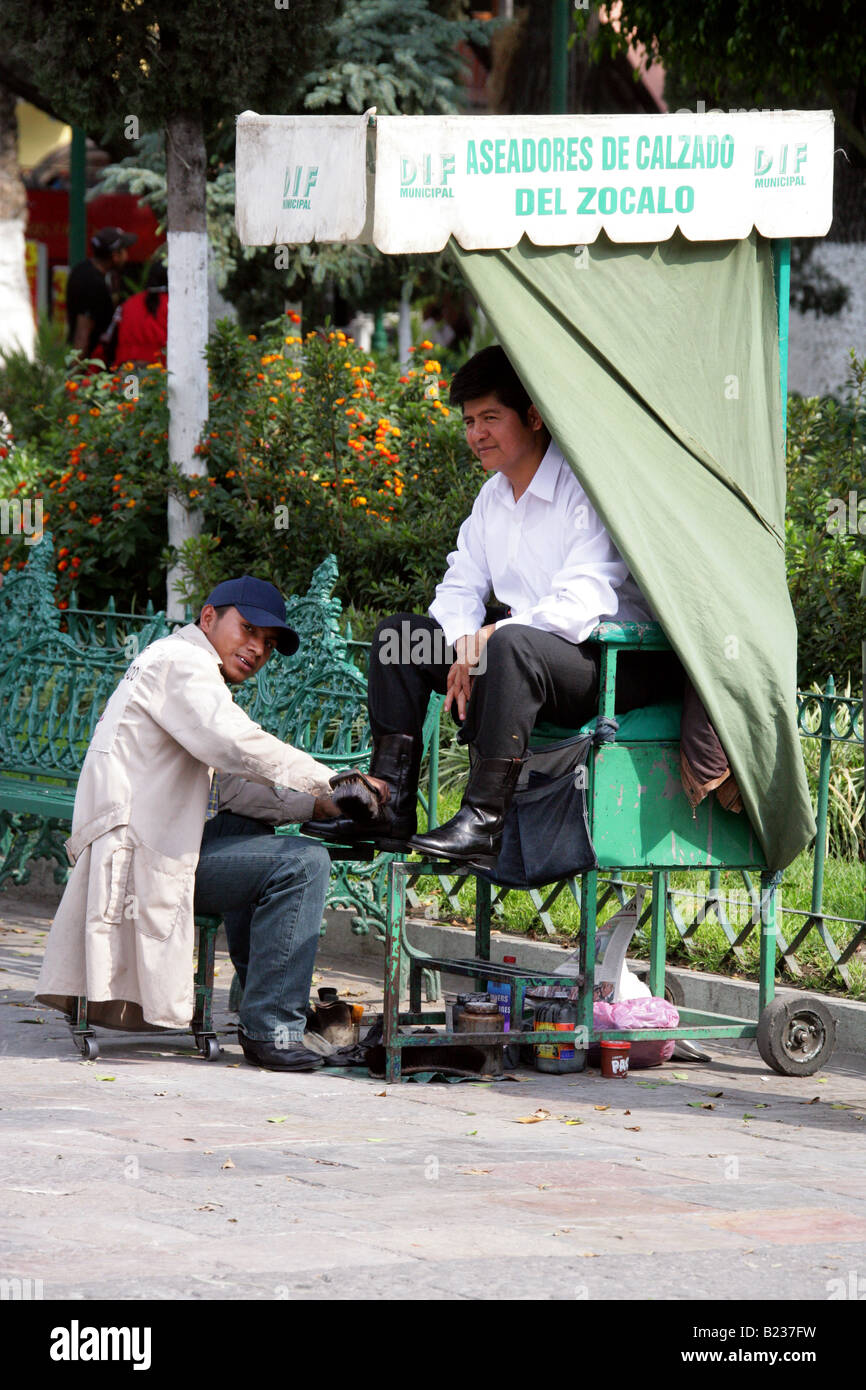 Shoe-shine Boy, Zocola Square, Puebla, Mexico Stock Photo