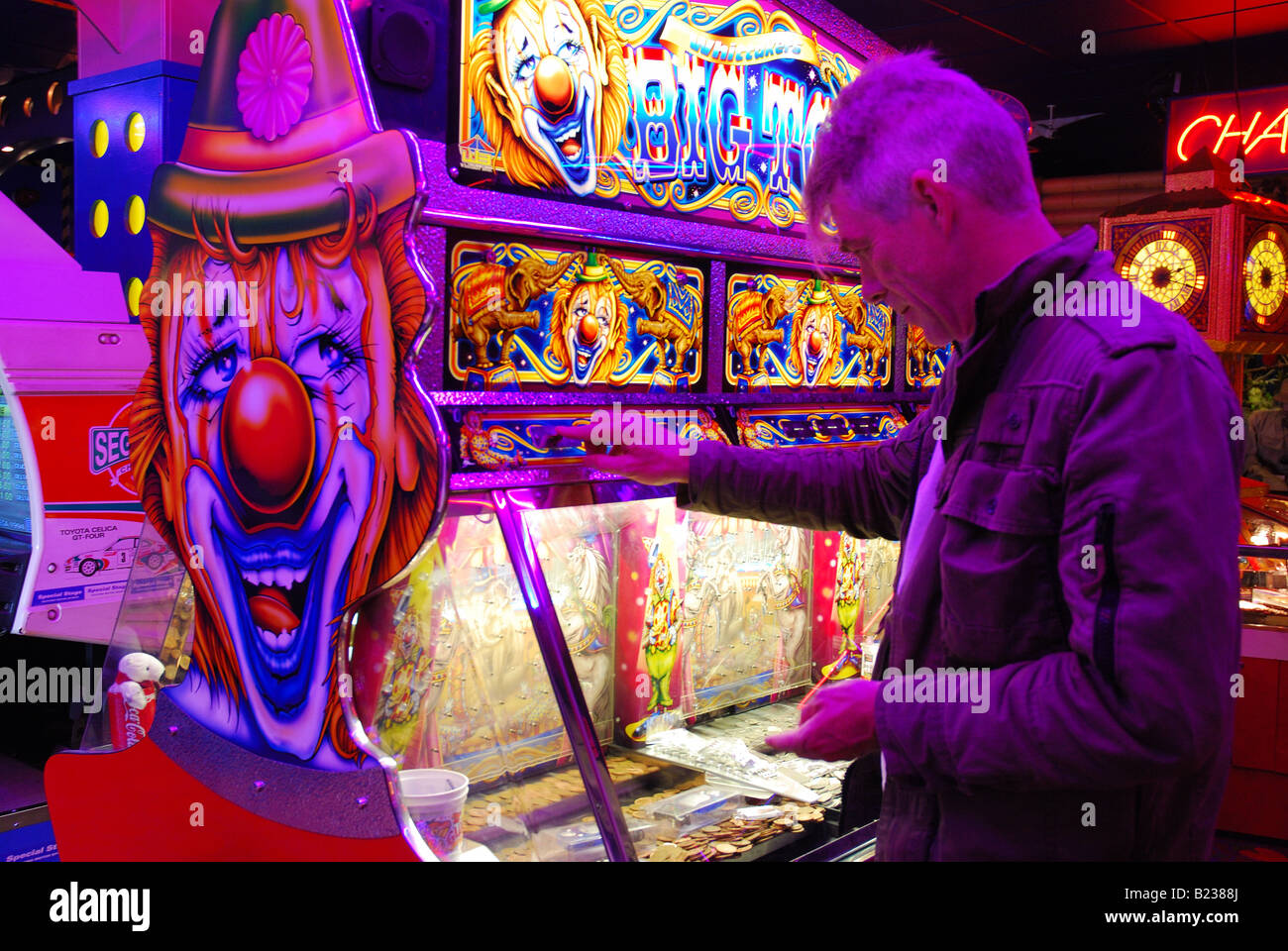 Playing the slot machines Stock Photo