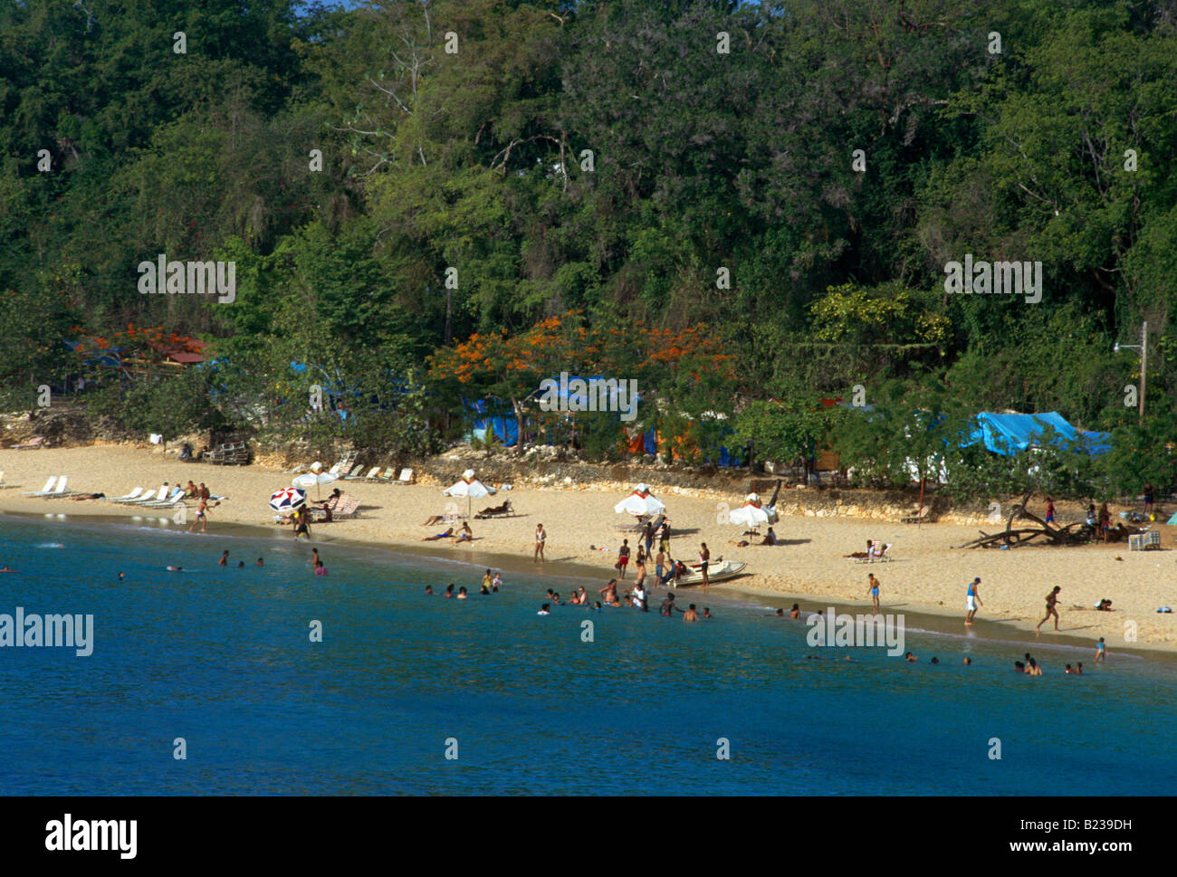 Sosua Dominican Republic Sosua Beach Sunbathing And Swimmers Stock Photo