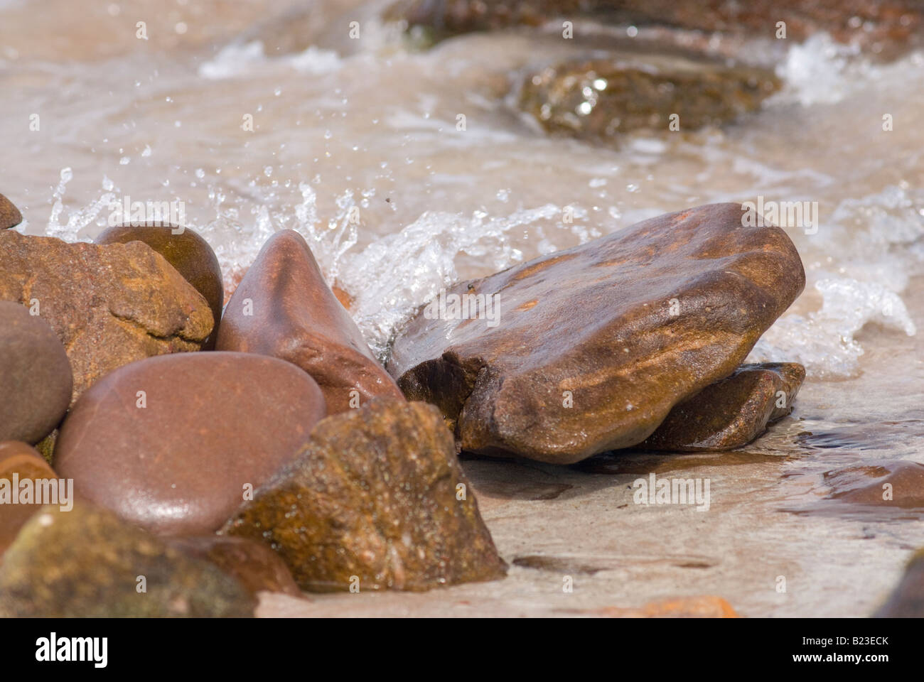 Stones in the sea hi-res stock photography and images - Alamy