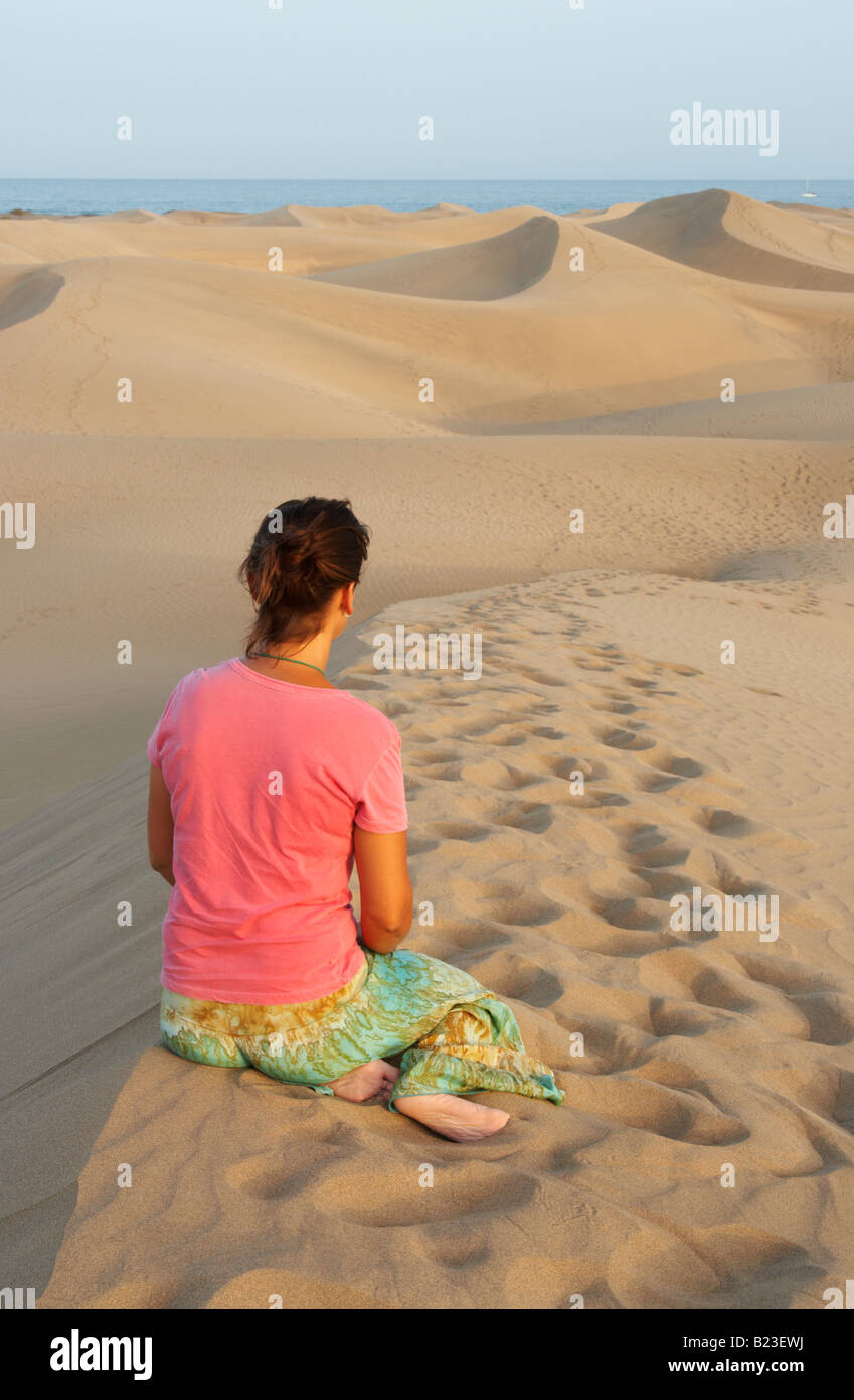 Woman in Las Dunas (the dunes) at Maspalomas on Gran Canaria in The Canary Islands Stock Photo