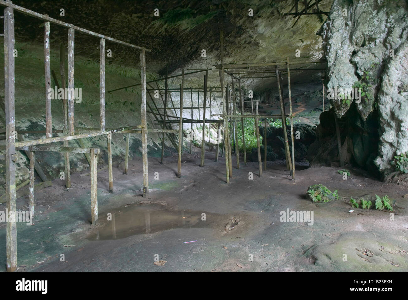 Abandoned birds nest collectors huts Traders Cave Niah Caves Niah National Park Sarawak Malaysia Stock Photo