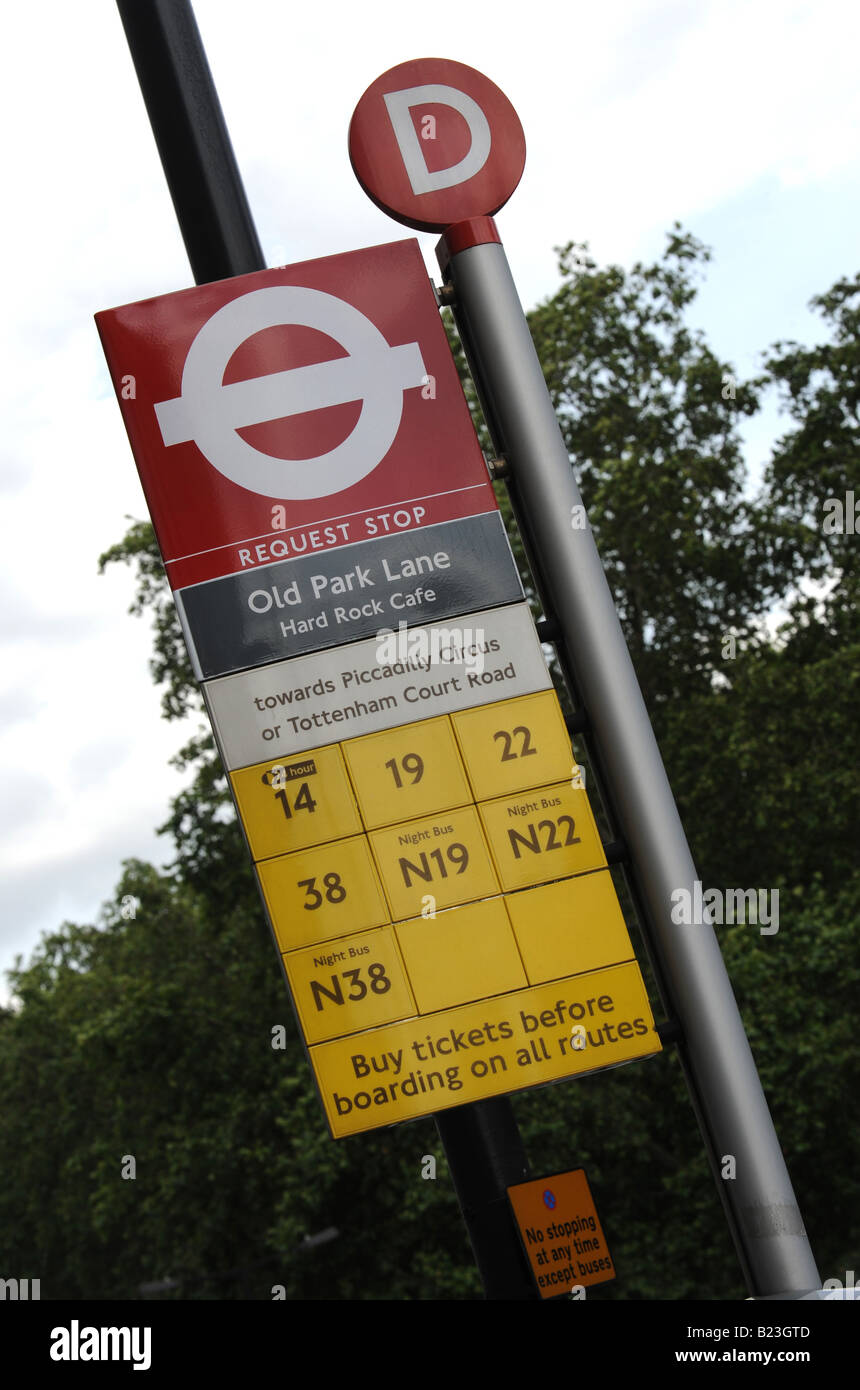 A request bus stop on Old Park Lane near the hard Rock Cafe London UK Stock Photo