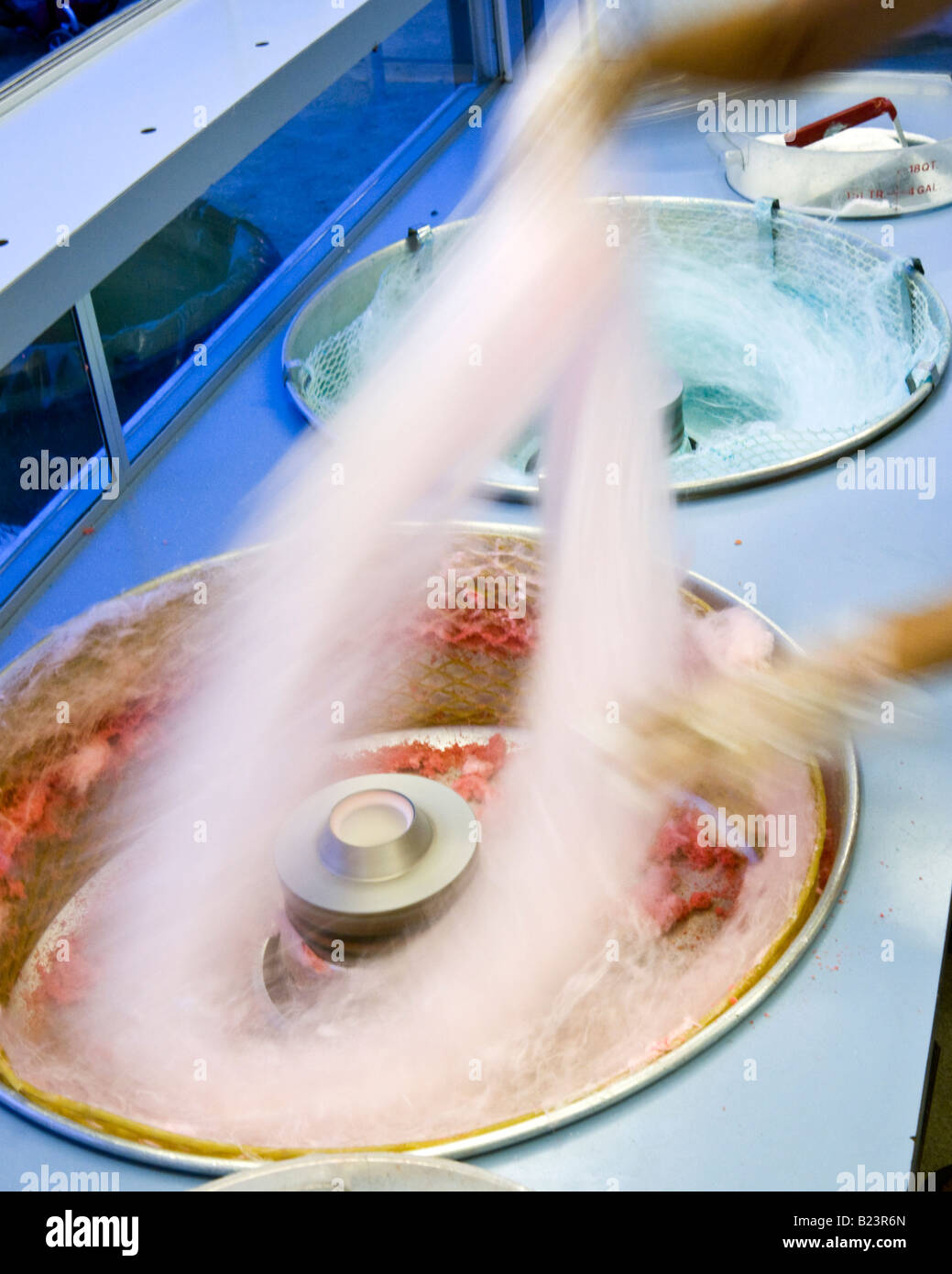 Making pink cotton candy at county fair Stock Photo