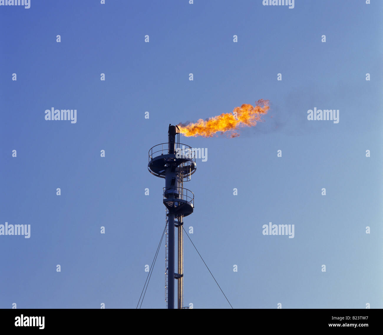 smokestack of oil reception and processing plant near city of rotterdam ...