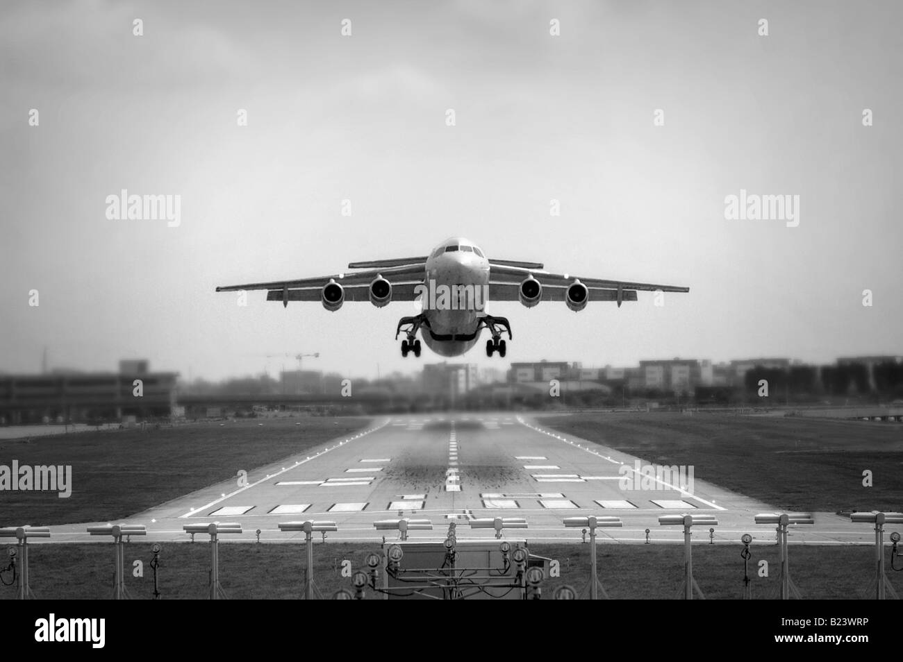Jet plane starting from the London City Airport Stock Photo