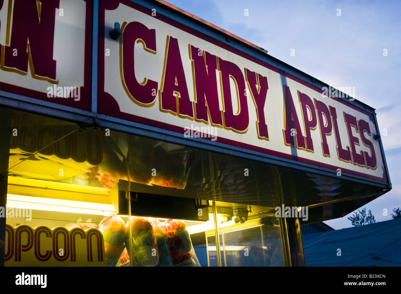 Concession stand with candy apples and popcorn at county fair Stock Photo