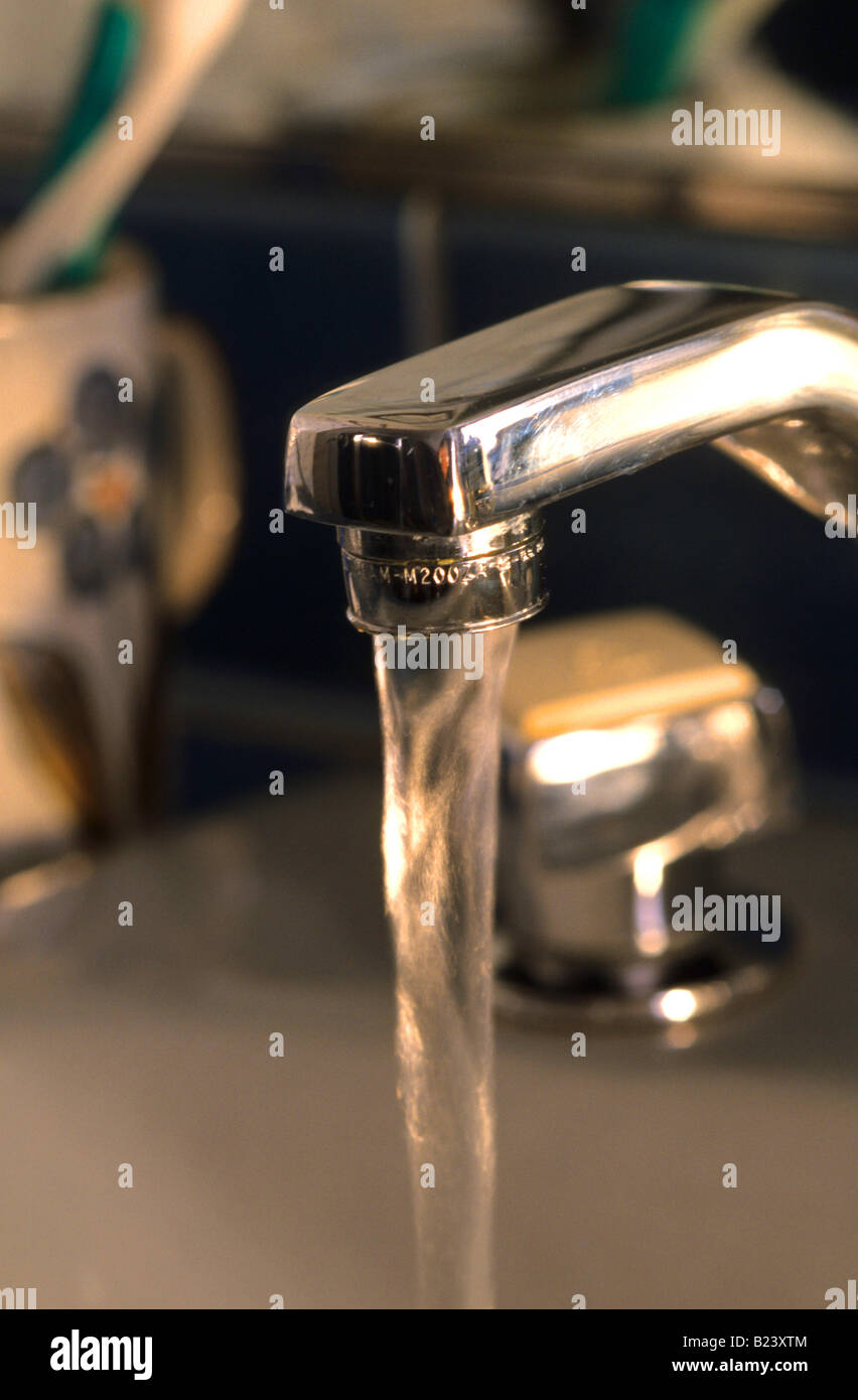 WATER RUNNING FROM FAUCET Stock Photo Alamy
