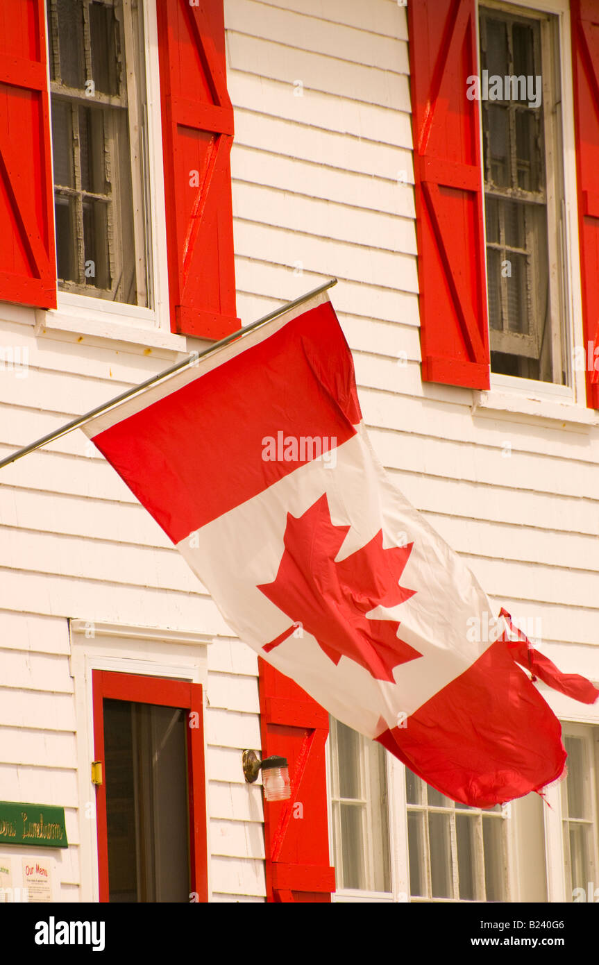 Canada New Brunswick Canadian Flag flying Cape Enrage Tea House Bay of Fundy Region Fundy Coast Stock Photo