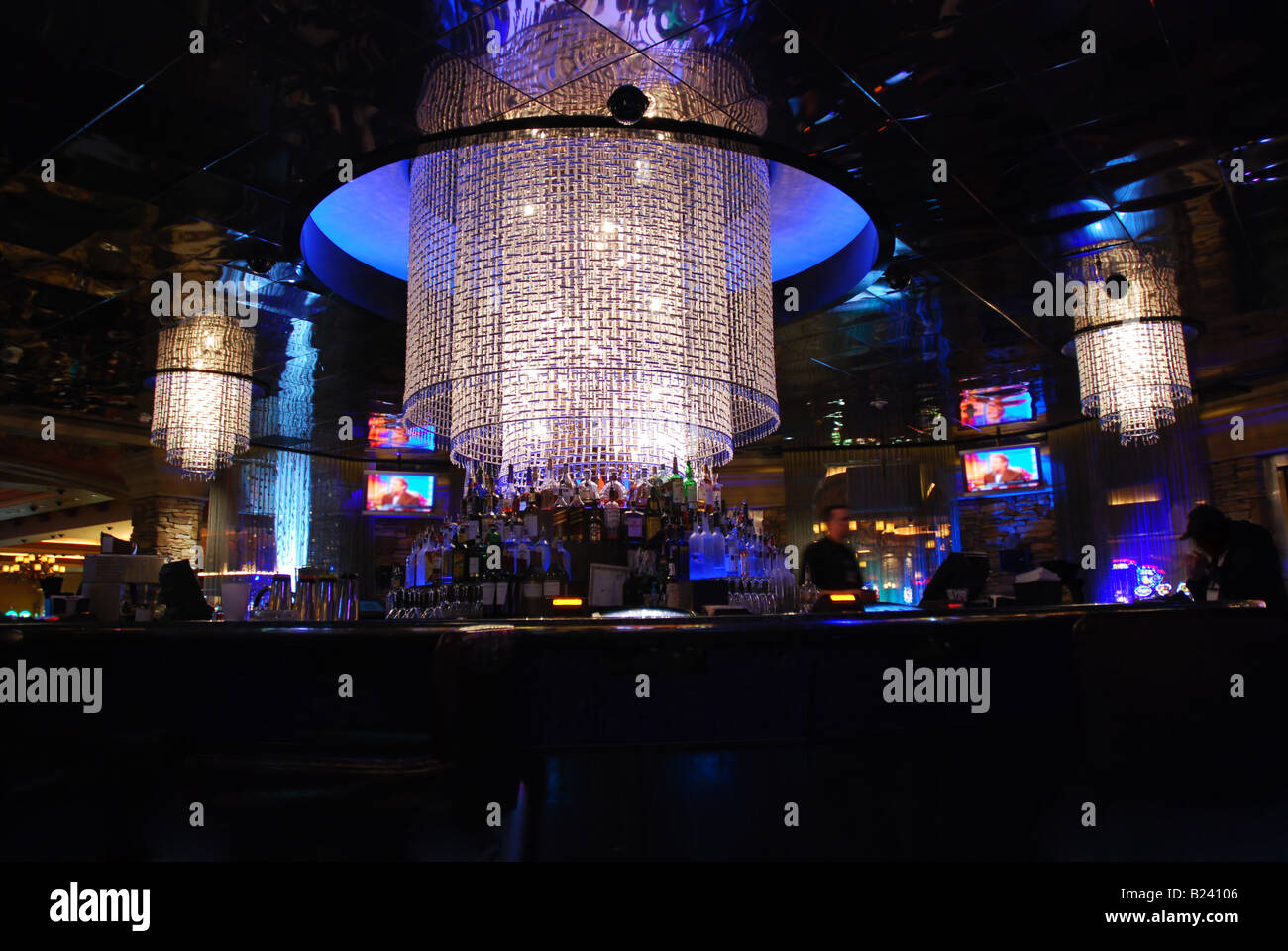 Elegant nightclub in a casino with blue lighting and glistening chandeliers  Stock Photo - Alamy