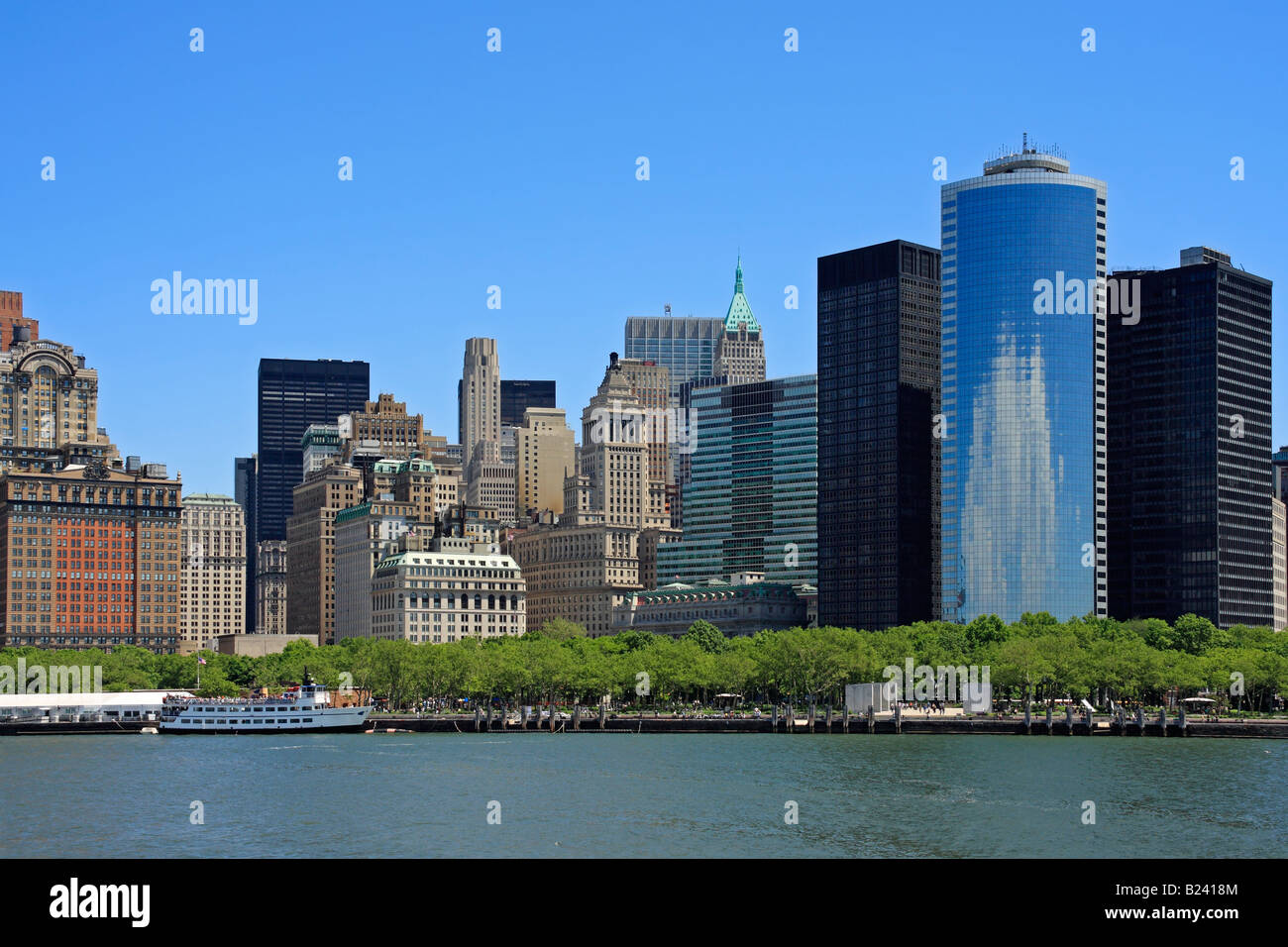 Lower Manhattan buildings and Hudson river from the Liberty Island ferry - New York City, USA Stock Photo