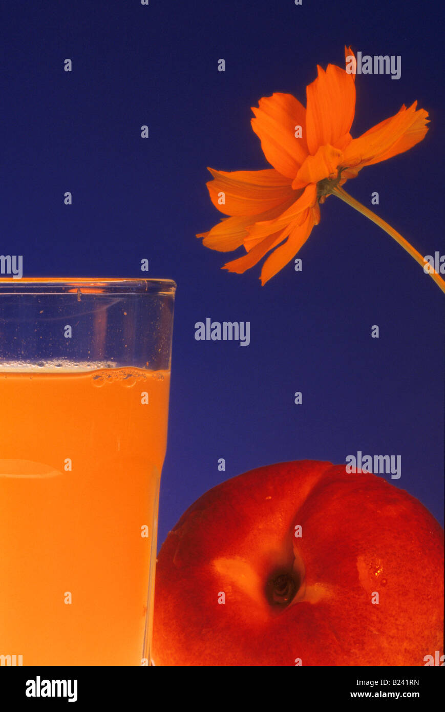 NECTARINE, ORANGE JUICE and FLOWER Stock Photo Alamy